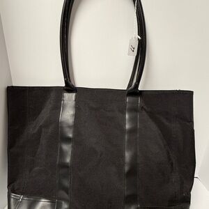 Calvin Klein black tote bag.  See picture for any wear or callouts